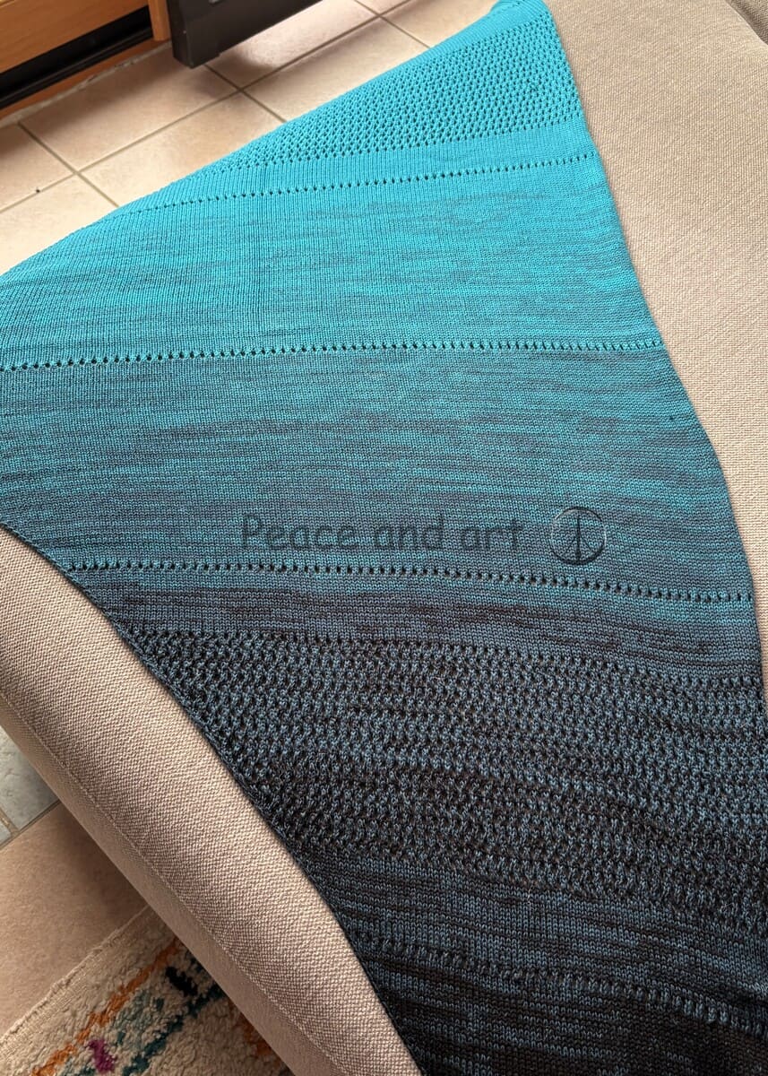 châle tricot machine turquoise